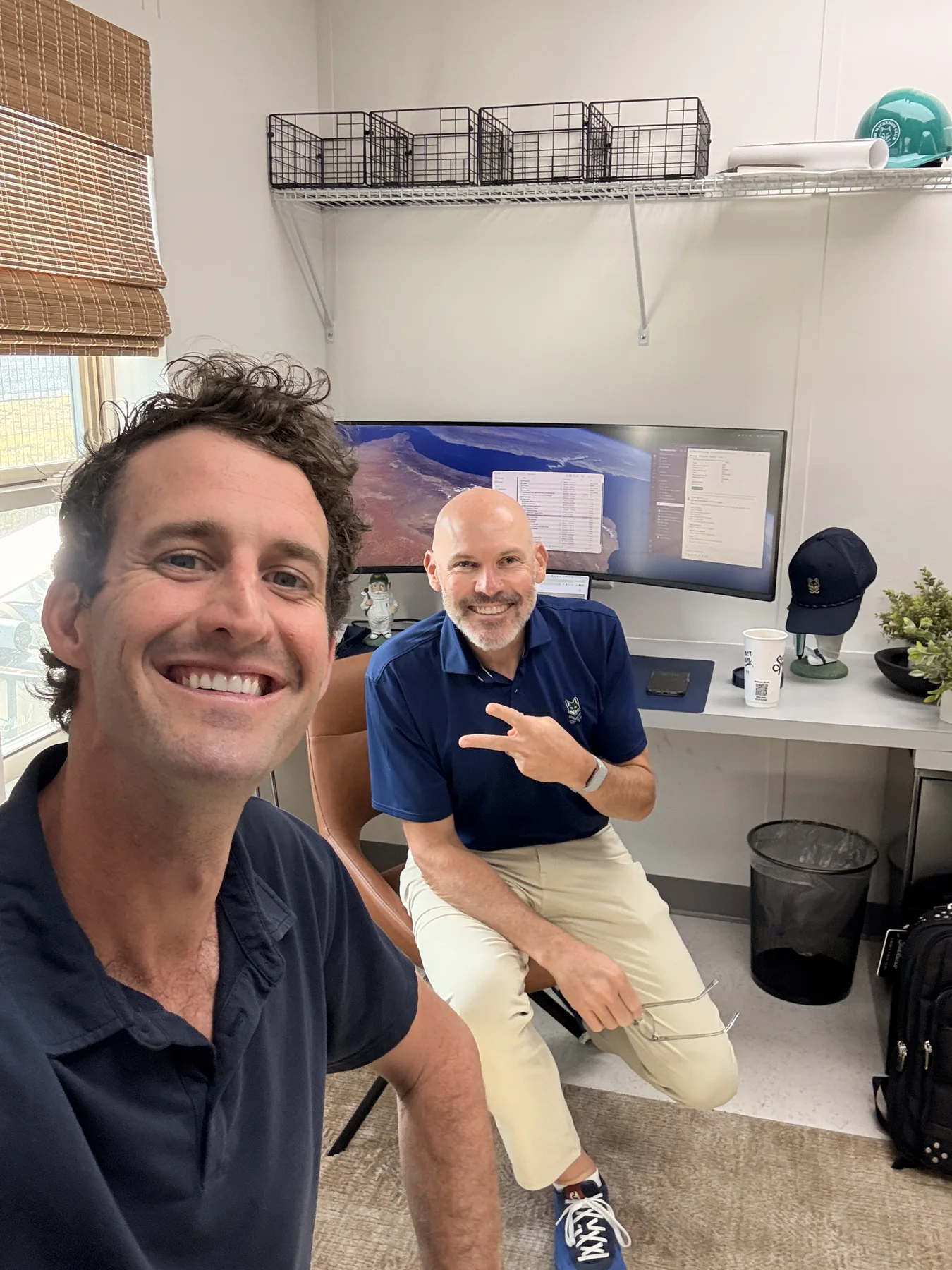 Two Mackenzie team members working inside the temporary membership office